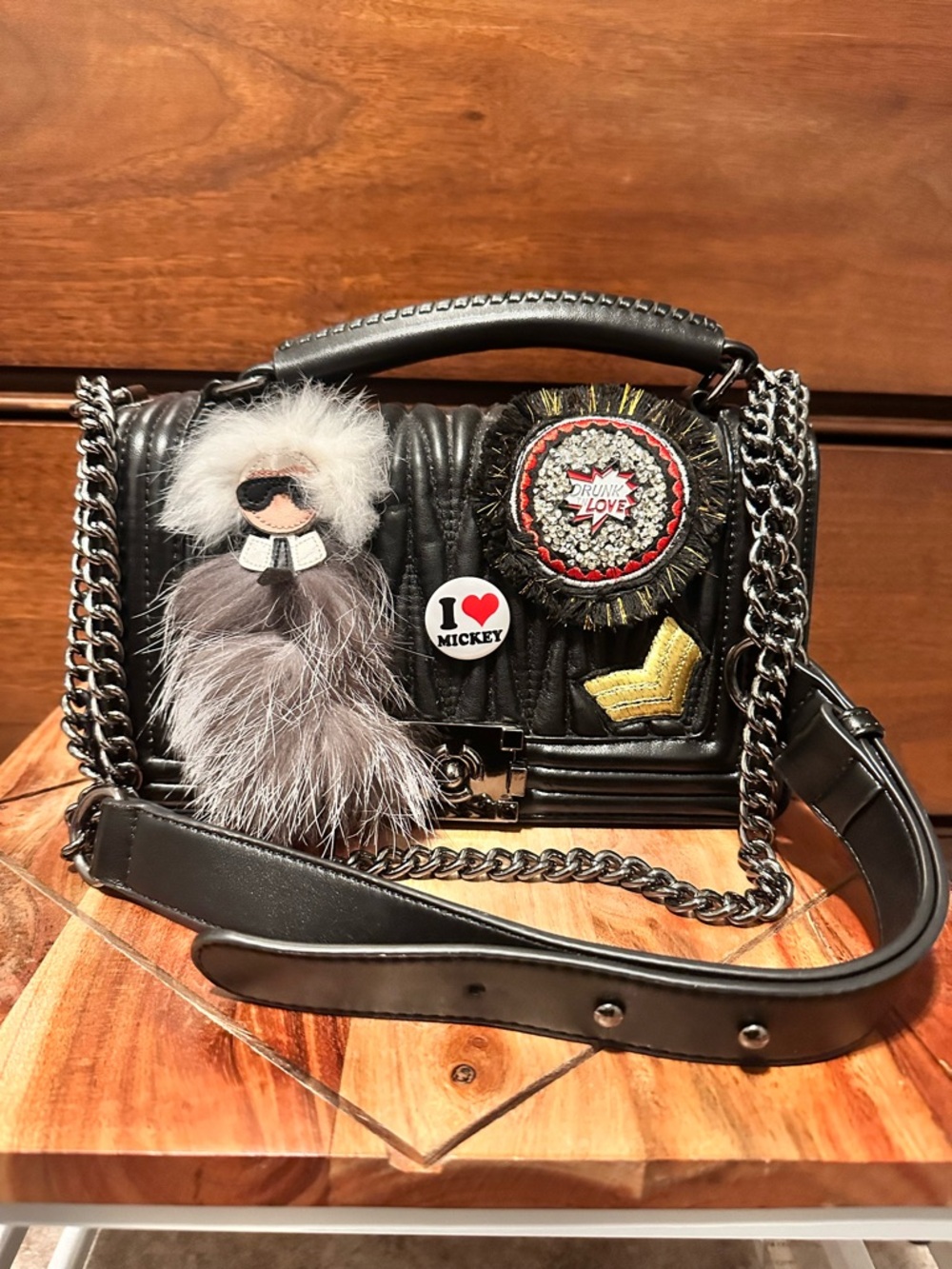 Black Quilted Crossbody Bag with Fur Charm and Patches